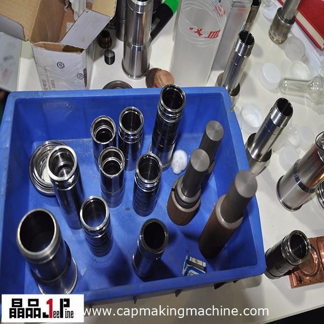 water bottle cap mold parts.jpg water bottle cap mold parts.jpg
